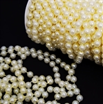 10mm Strung Plastic Pearls - Ivory